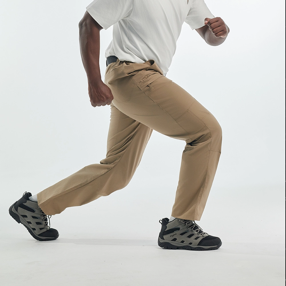 Outdoor hiking pants demonstrating stretch and flexibility, suitable for climbing, walking, or tactical use.