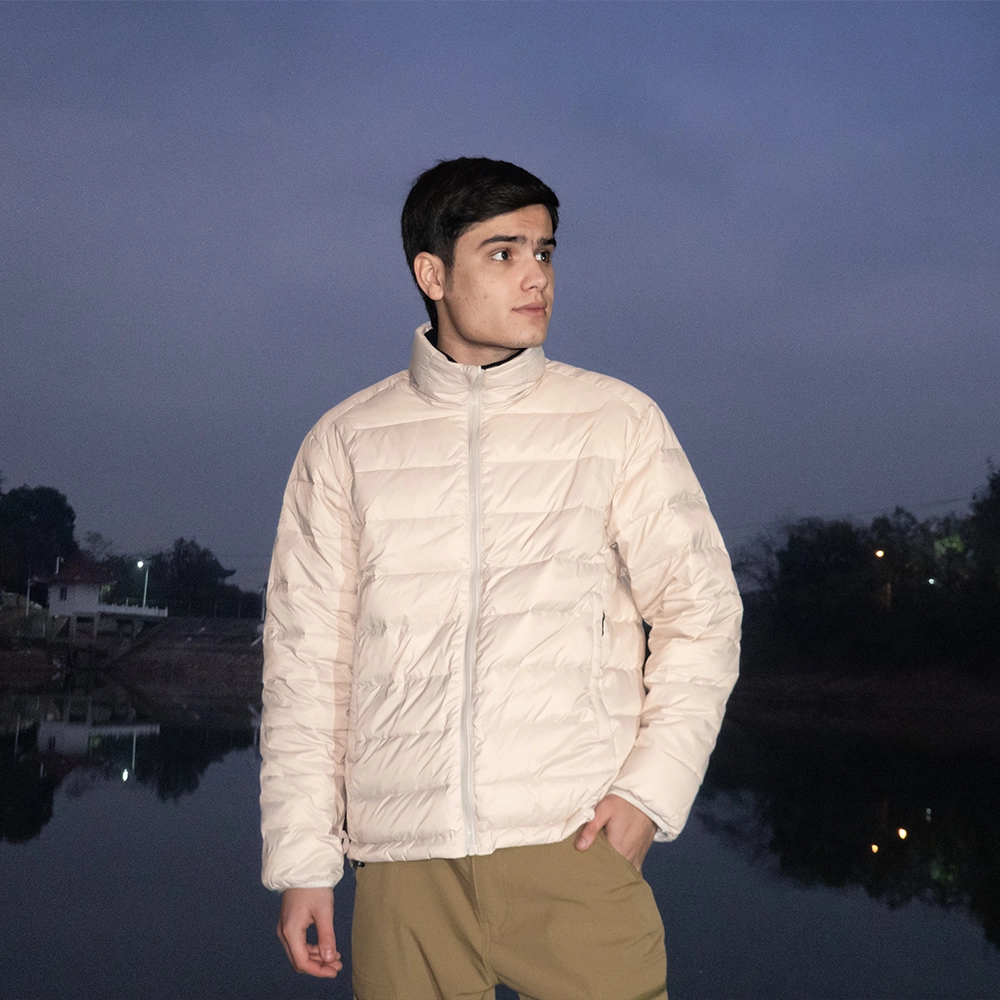 Lightweight beige inner insulated jacket from the 3 in 1 waterproof system, providing warmth and comfort, perfect for layering in cold weather.