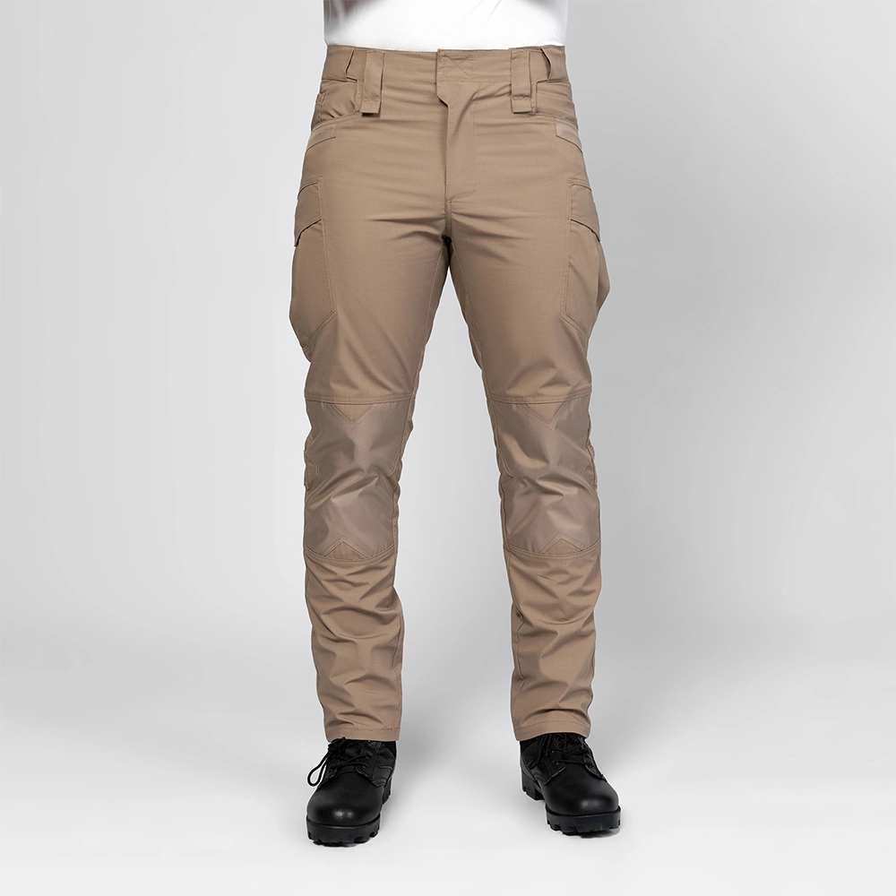 Full-body view of khaki men’s waterproof hiking pants, featuring durable ripstop fabric and tactical pocket layout for outdoor and tactical use.
