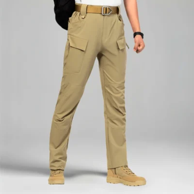 Model wearing khaki outdoor pants with multi-pocket design, ideal for hiking, camping, or outdoor work.