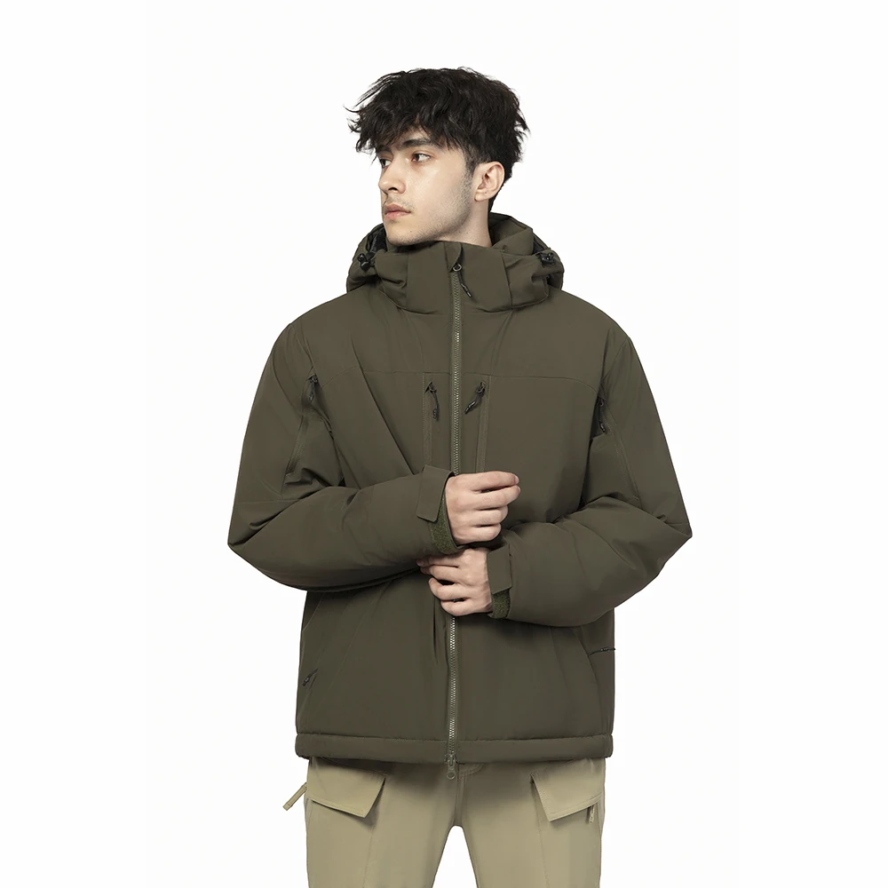 Model wearing army green waterproof winter jacket with hood, insulated padding, and multiple zip pockets for outdoor cold weather use.