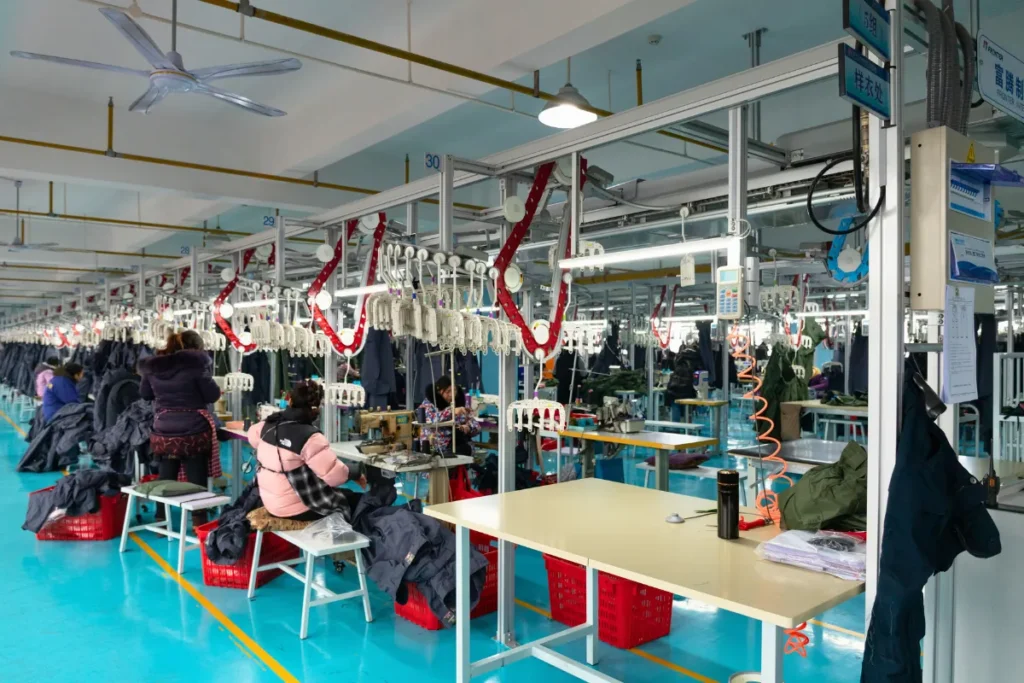 Outdoor apparel production line at Frontergroup manufacturing facility in Hanchuan, Hubei, China